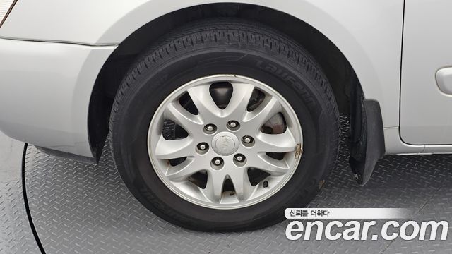 Kia Canival 2012 — photo 5