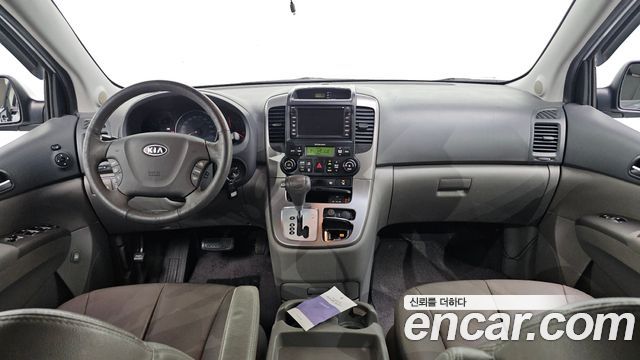Kia Canival 2012 — photo 7
