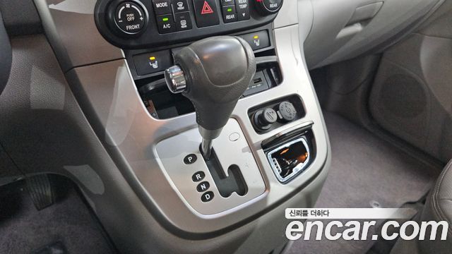 Kia Canival 2012 — photo 9