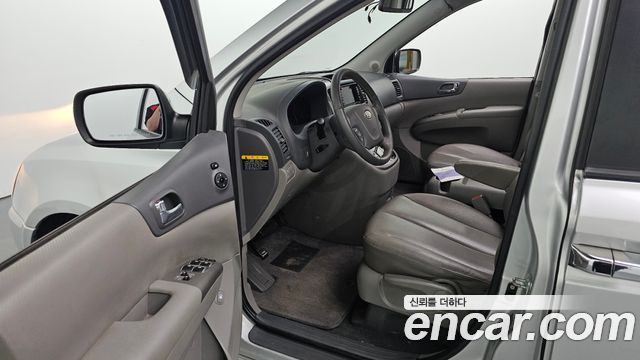 Kia Canival 2012 — photo 10