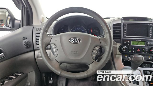 Kia Canival 2012 — photo 11