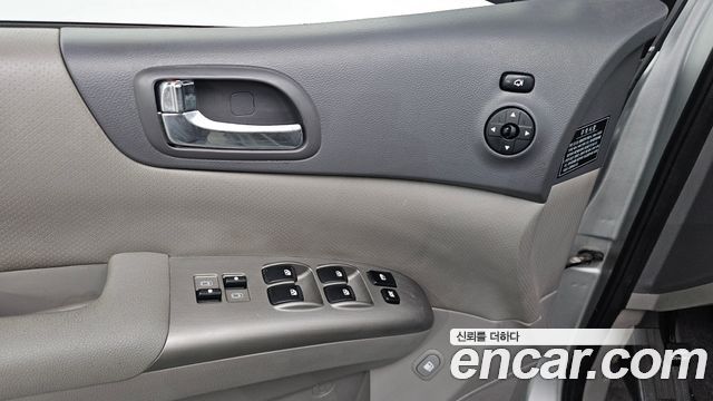 Kia Canival 2012 — photo 15