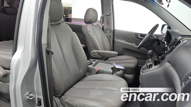 Kia Canival 2012 — photo 16