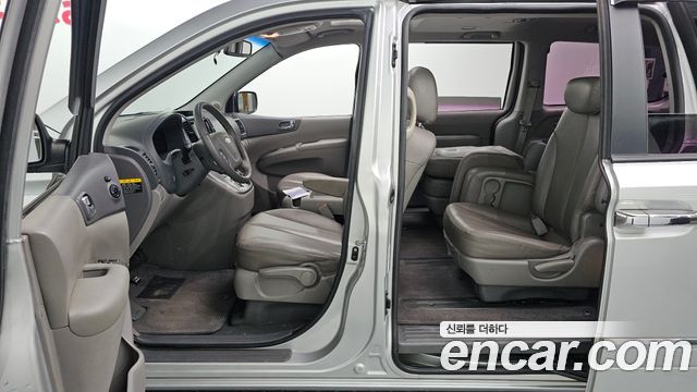 Kia Canival 2012 — photo 18