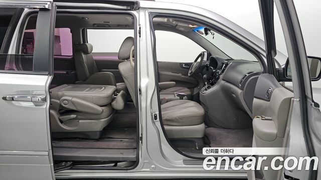 Kia Canival 2012 — photo 19