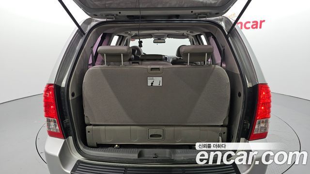 Kia Canival 2012 — photo 20