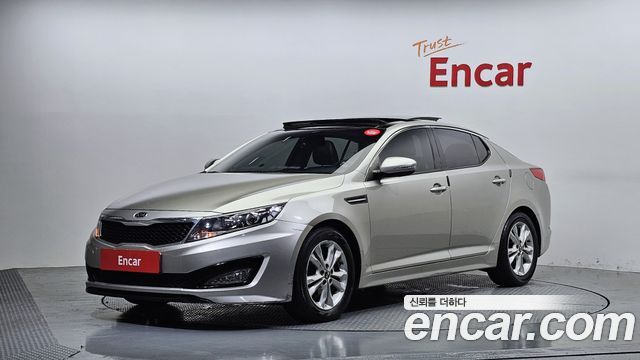 Kia K5 2011 — photo 1