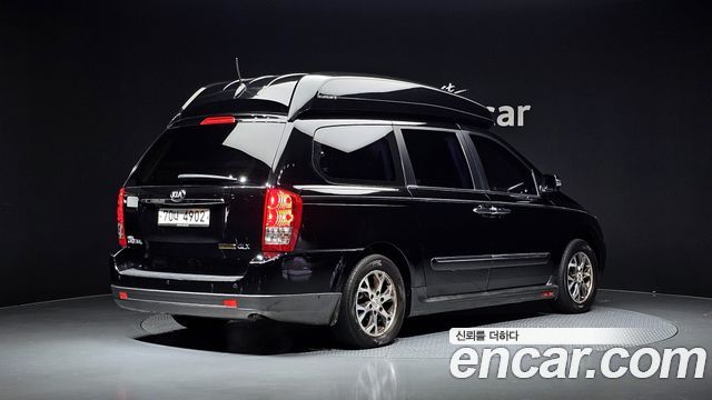 Kia Canival 2014 — photo 2