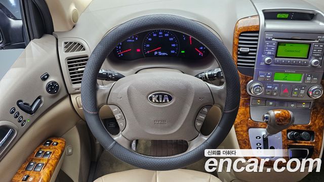 Kia Canival 2014 — photo 13