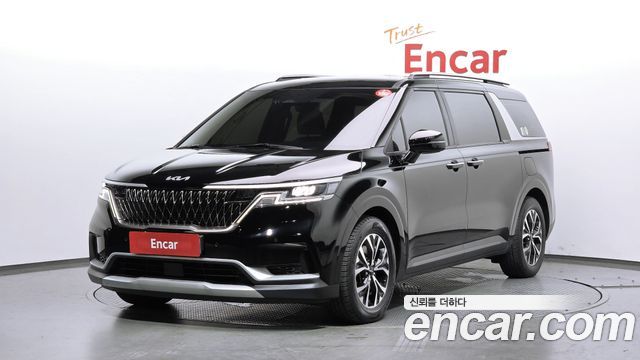 Kia Canival 2023 — photo 1