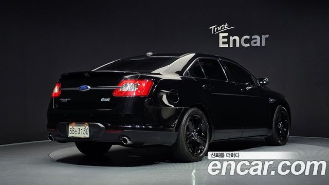 Ford Taurus 2012 — photo 2