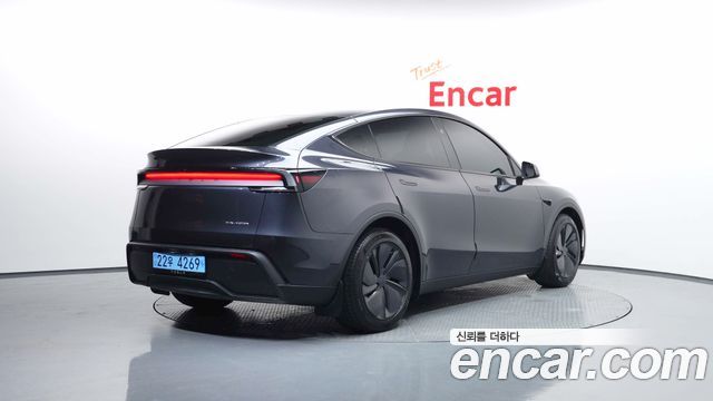 Tesla Model Y 2025 — photo 2
