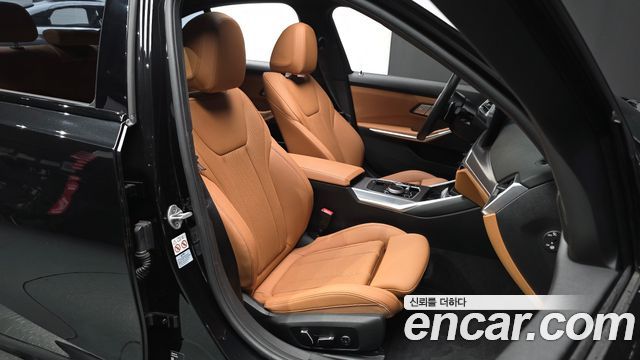 BMW 3-Series 2024 — photo 16
