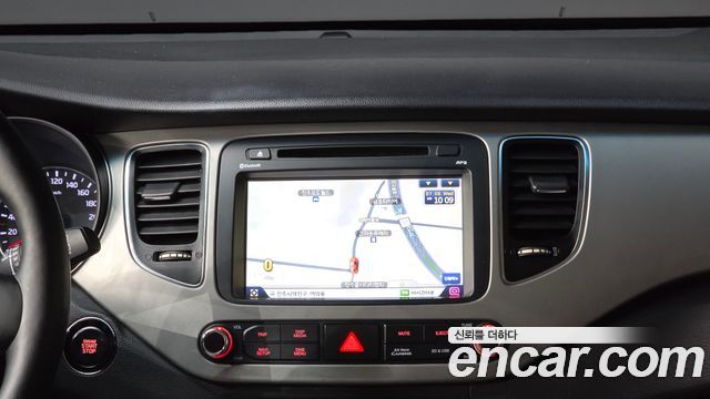 Kia Carens 2014 — photo 16