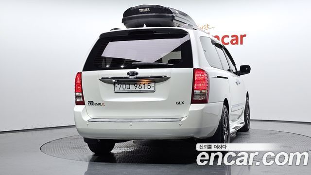 Kia Canival 2011 — photo 4