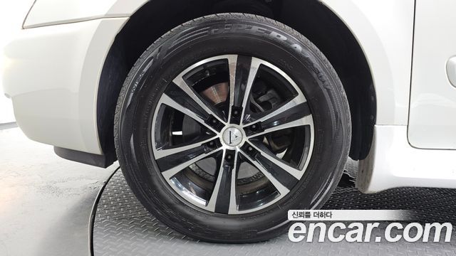Kia Canival 2011 — photo 5