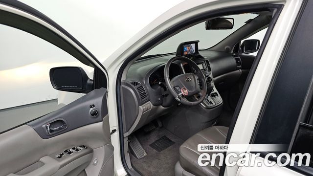 Kia Canival 2011 — photo 13
