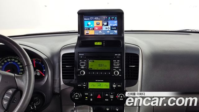 Kia Canival 2011 — photo 21