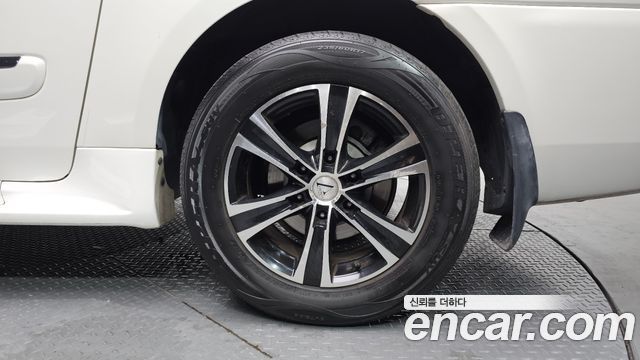 Kia Canival 2011 — photo 7