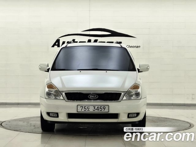 Kia Canival 2011 — photo 3