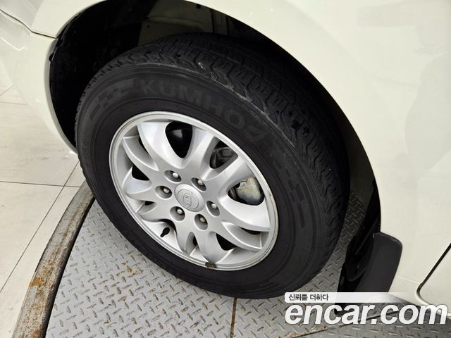 Kia Canival 2011 — photo 6