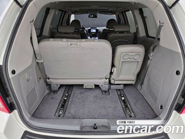 Kia Canival 2011 — photo 11