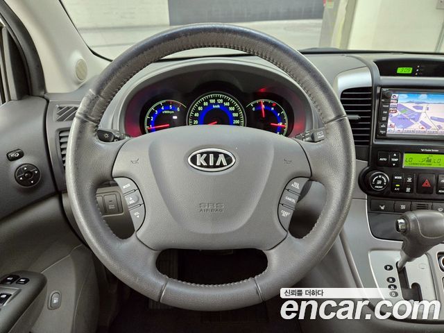 Kia Canival 2011 — photo 12