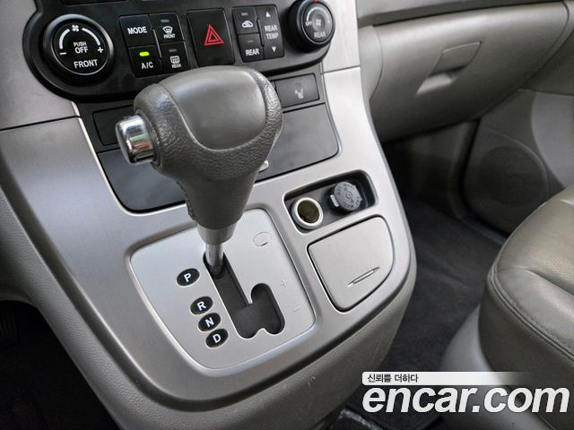 Kia Canival 2011 — photo 14