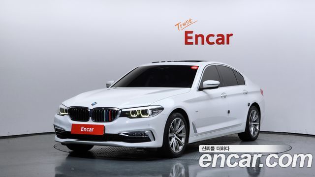 BMW 5-Series 2018 — photo 1
