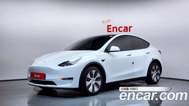 Tesla Model Y 2021 — photo 1