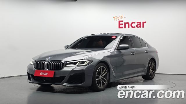 BMW 5-Series 2023 — photo 1