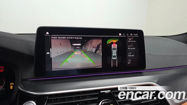 BMW 5-Series 2023 — photo 14