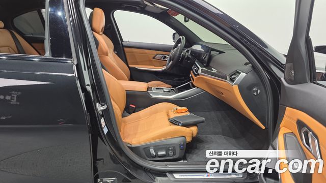 BMW 3-Series 2023 — photo 16