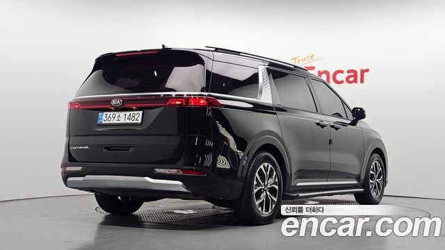 Kia Canival 2021 — photo 2