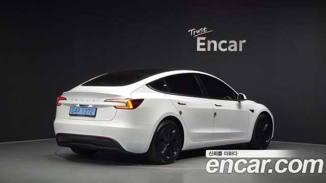 Tesla Model 3 2024 — photo 2