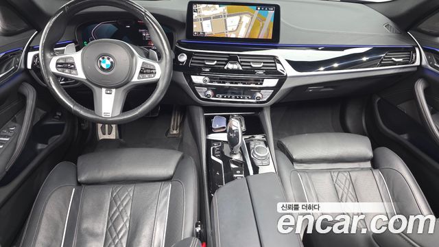 BMW 5-Series 2022 — photo 10