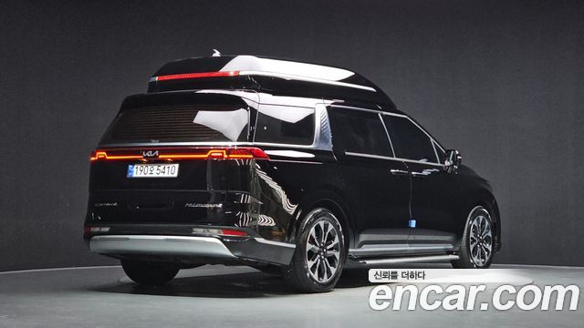 Kia Canival 2021 — photo 2