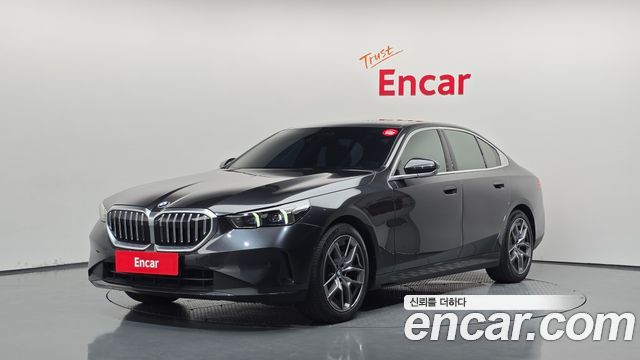 BMW 5-Series 2024 — photo 1