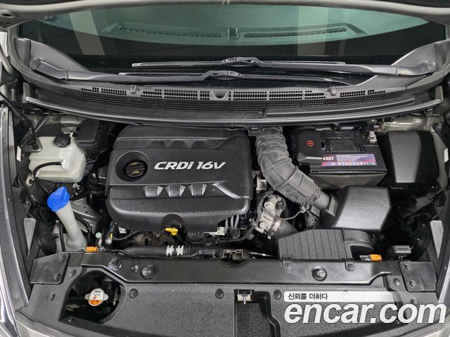 Kia Carens 2014 — photo 20