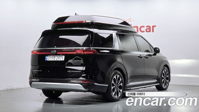 Kia Canival 2021 — photo 2