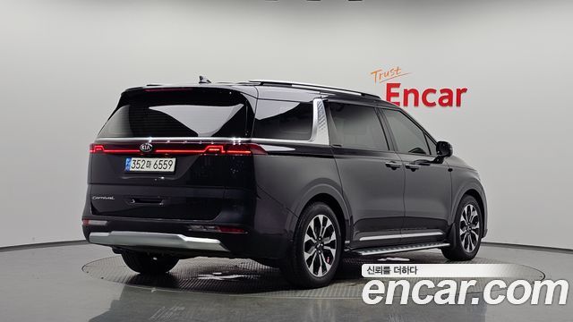 Kia Canival 2021 — photo 2