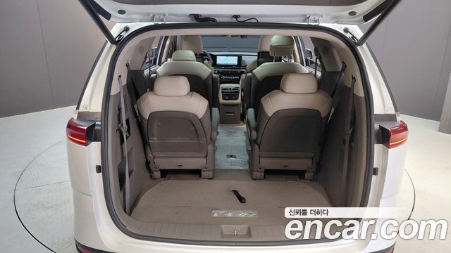 Kia Canival 2023 — photo 26