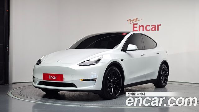 Tesla Model Y 2022 — photo 1