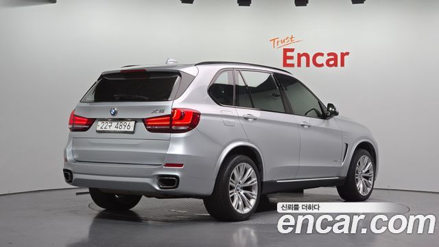 BMW X5 2015 — photo 2