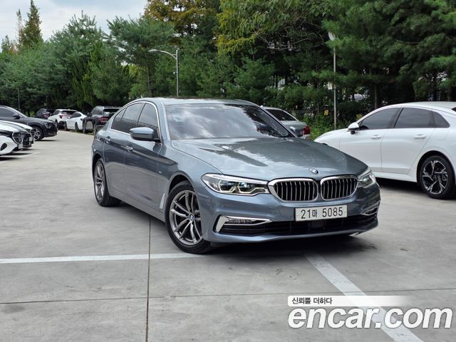BMW 5-Series 2018 — photo 1