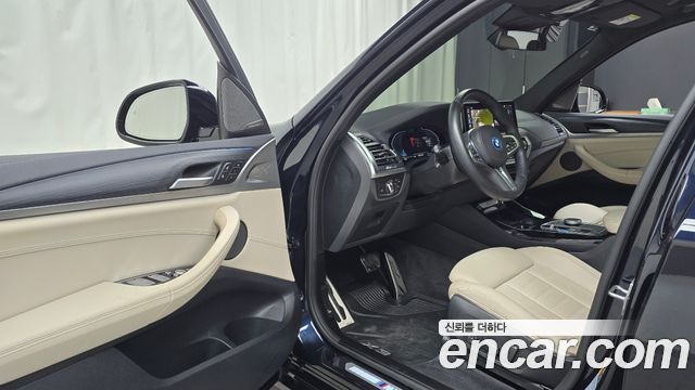 BMW iX3 2024 — photo 13