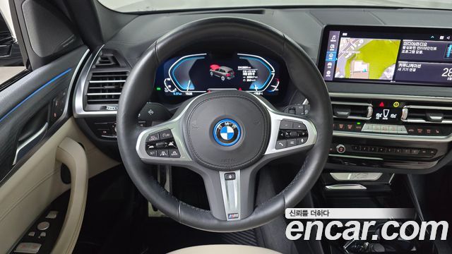 BMW iX3 2024 — photo 18