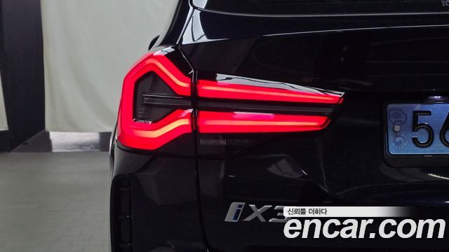 BMW iX3 2024 — photo 9
