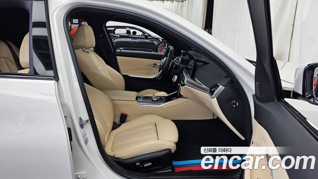 BMW 3-Series 2023 — photo 17