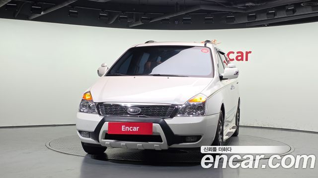 Kia Canival 2010 — photo 3